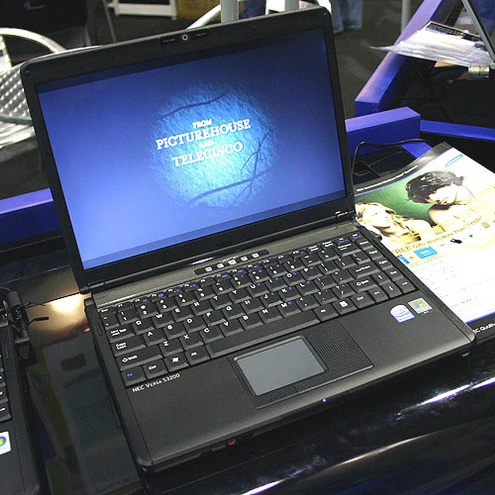  A lesser version of the NEC Versa 3300 is the 3200, which only has a dual core processor (T2130). The graphics chipset is the older Intel GMA950 though its coal black metal alloy chassis looks quite elegant. There's only a 4-cell Li-Ion battery though for this 13.3-inch notebook. NEC has included free gifts worth more than $169, including a Trek 2GB thumb drive and a designer carrying case.  