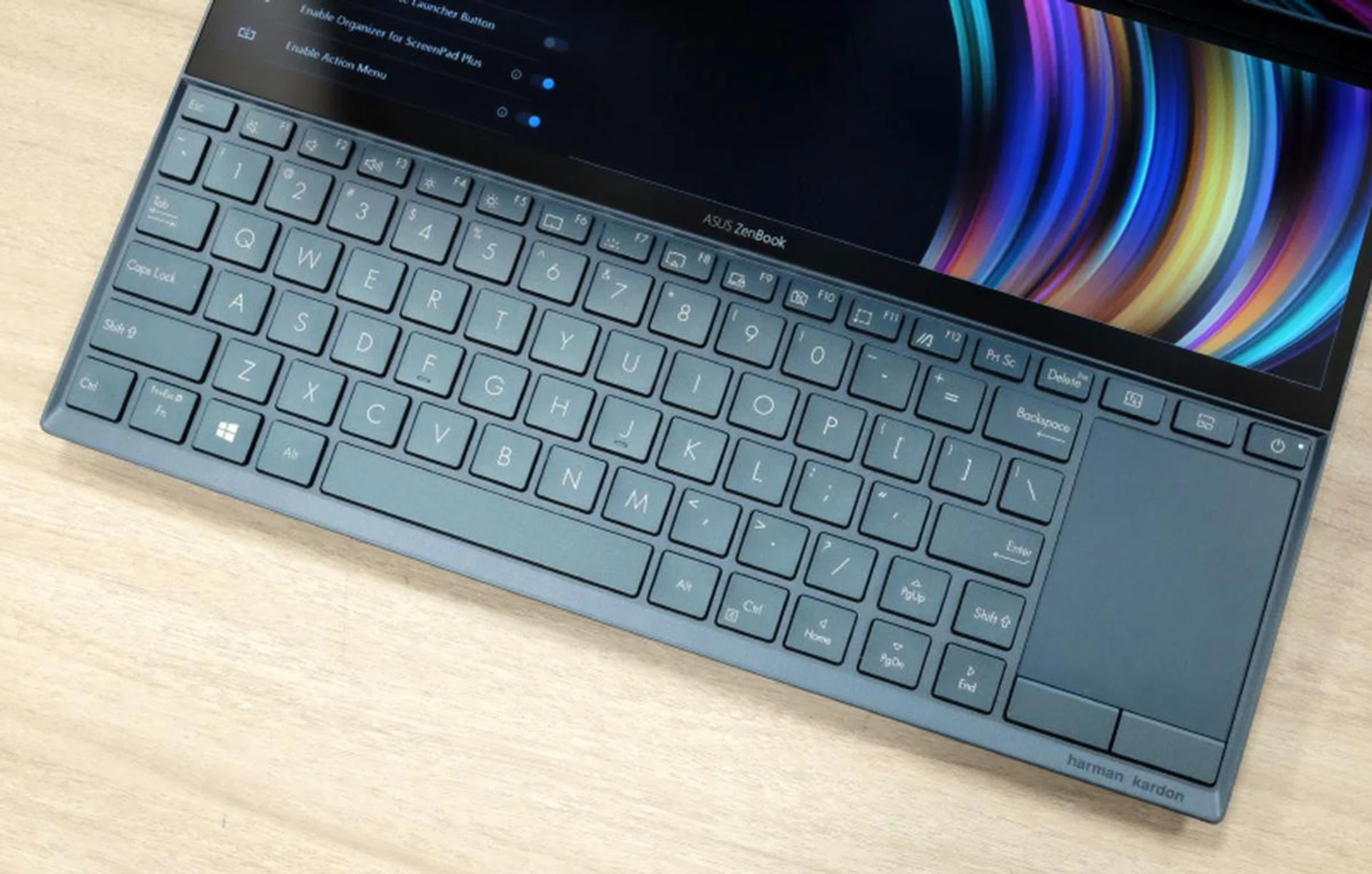 Because of the ScreenPad Plus, the keyboard and trackpad have to be shifted to the edge of the notebook.