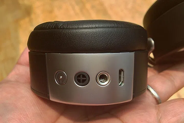 At the bottom of the right earcup sits the power button. You can also see the line-in jack, and the microUSB port that's used for charging the battery.