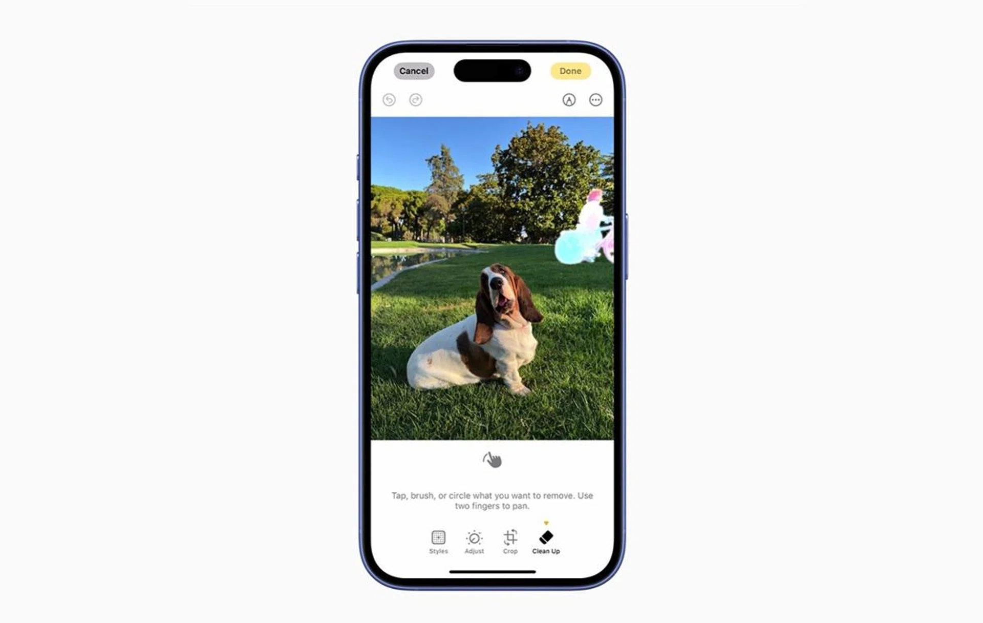 Apple Intelligence's Clean Up in action. The rainbow-highlighted cyclist at the back is the removal made to this sample. Image: Apple.