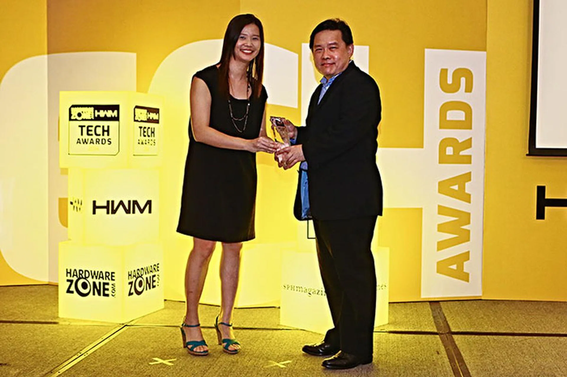 HP took home the Readers' Choice award for Best Laser Printer Brand. Here's Mr. Neo Kai Tee, Regional Business Manager for HP, receiving the trophy.