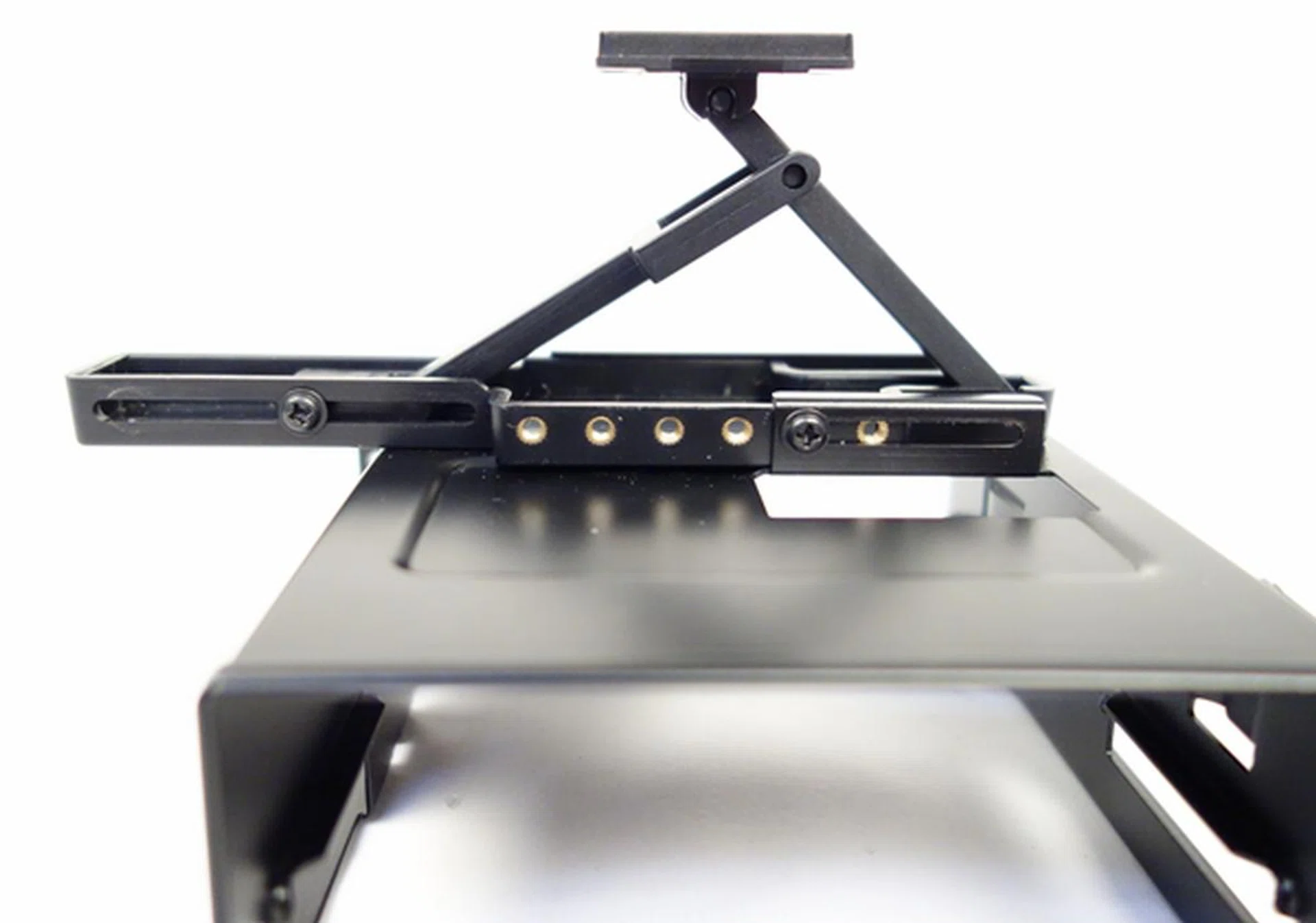 The CPU cooler support arm that is found on one of the 3.5-inch drive enclosures.