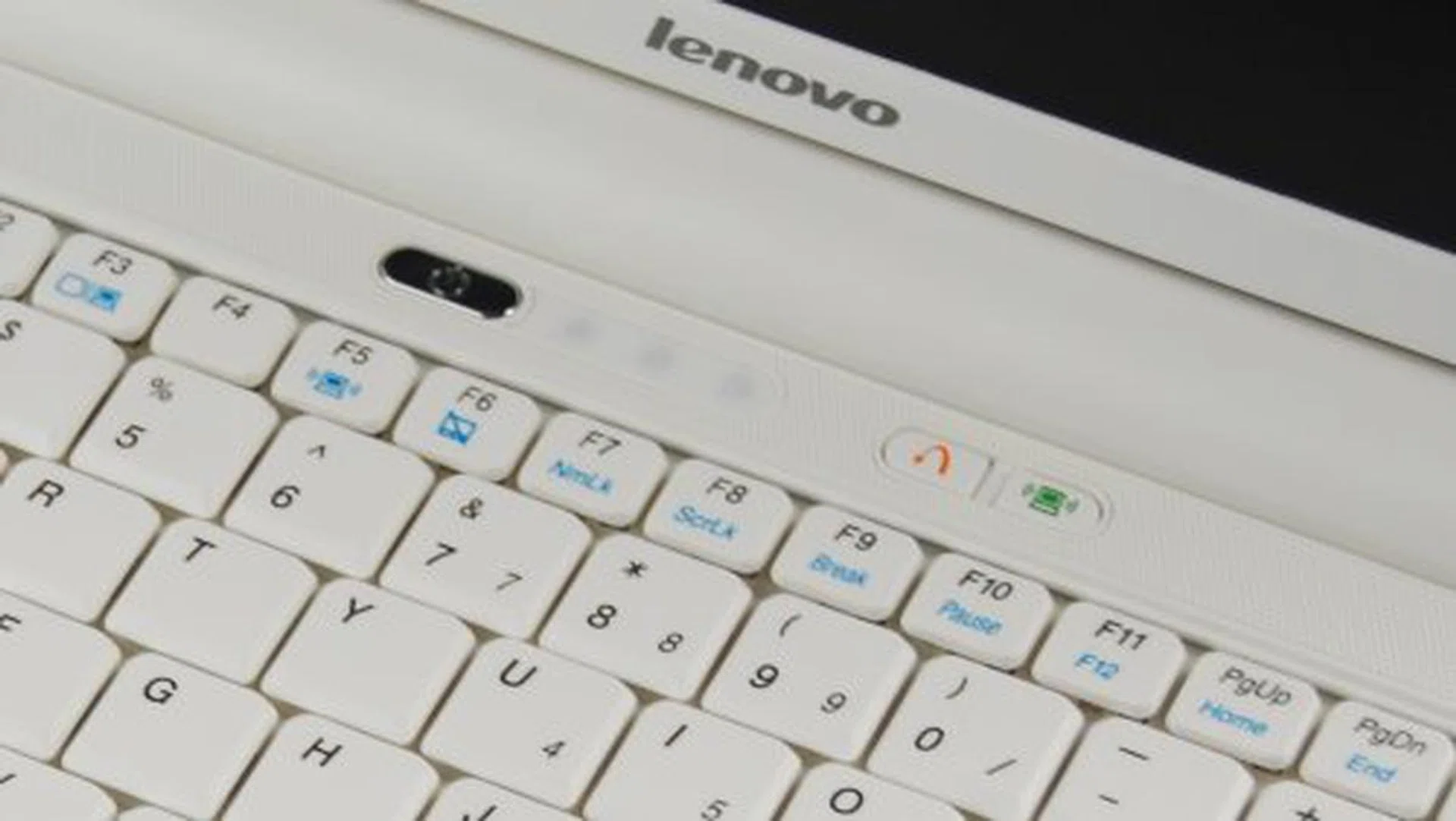 Keeping things simple with just these three buttons on the netbook: (from left to right) the power button, wireless toggle and Lenovo's Recovery button.
