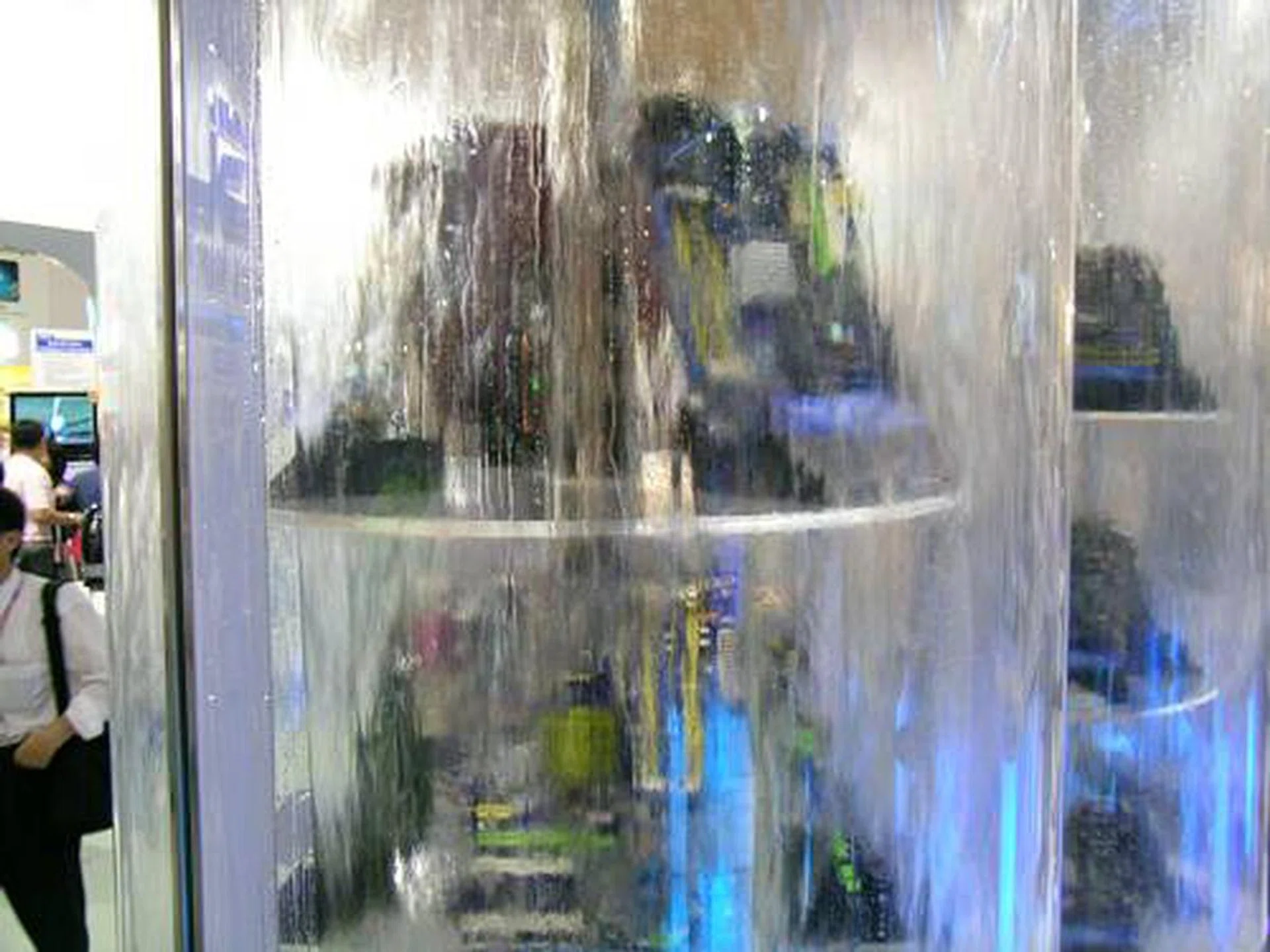 Not only is Foxconn poised to move into the high-end market with enthusiast motherboards and graphics cards, getting involved with global gaming circles is also part of their new 'EnterGaming Evolution' focus. We guessed that drowning out their product displays must also be a tactic to get us focused on them gaming girls too.