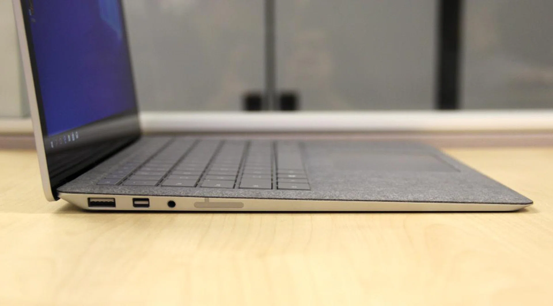 The Surface Laptop is nearly 15mm thick at its thickest point. However, it tapers at one end so it isn't as bulky as you might think it to be.