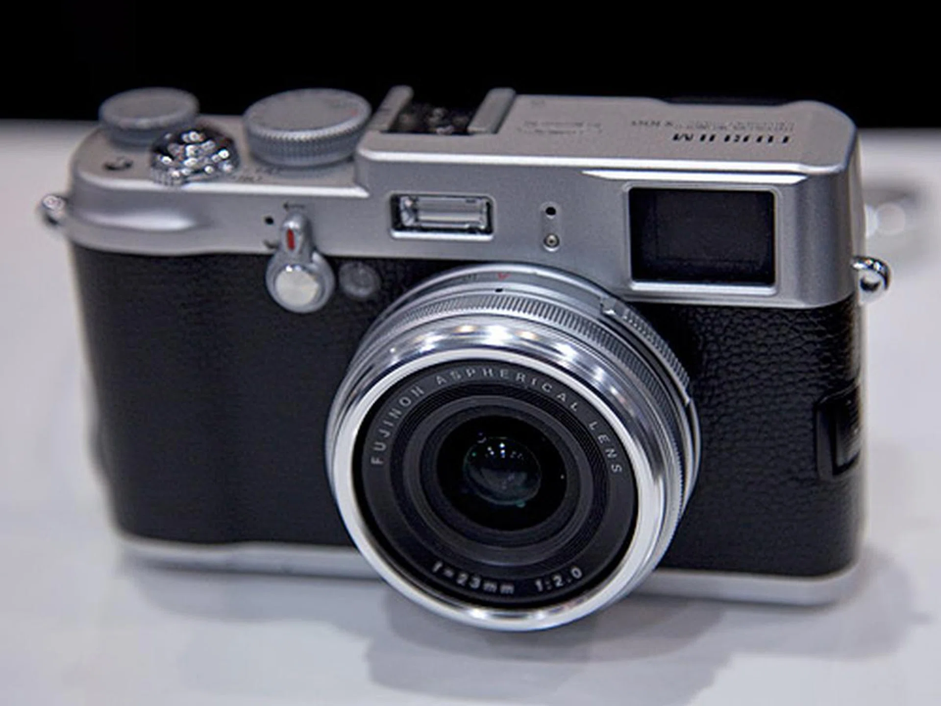 The much talked about FinePix X100 with its large APS-C sensor and a classic body design made its appearance at FujiFilm's booth.