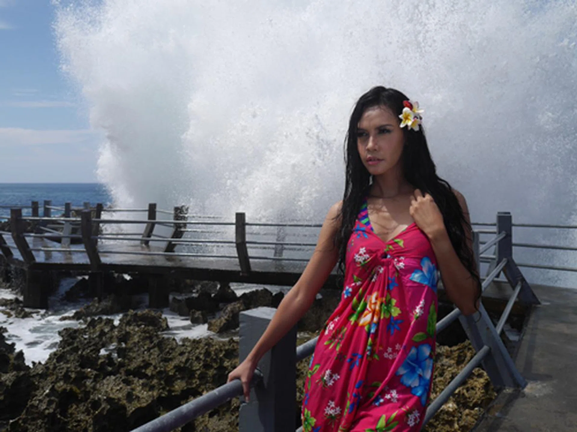 The GF6's shutter speed and burst mode is pretty impressive as we were able to capture the wave hitting the rocks behind this model in a series of successive shots.  