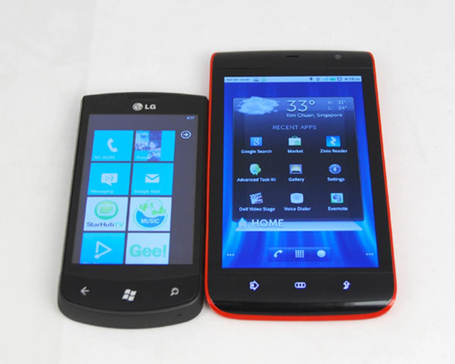 The Dell Streak (right) blurs the line with its intention to be a tablet with smartphone features similar to the LG Optimus 7 (left).