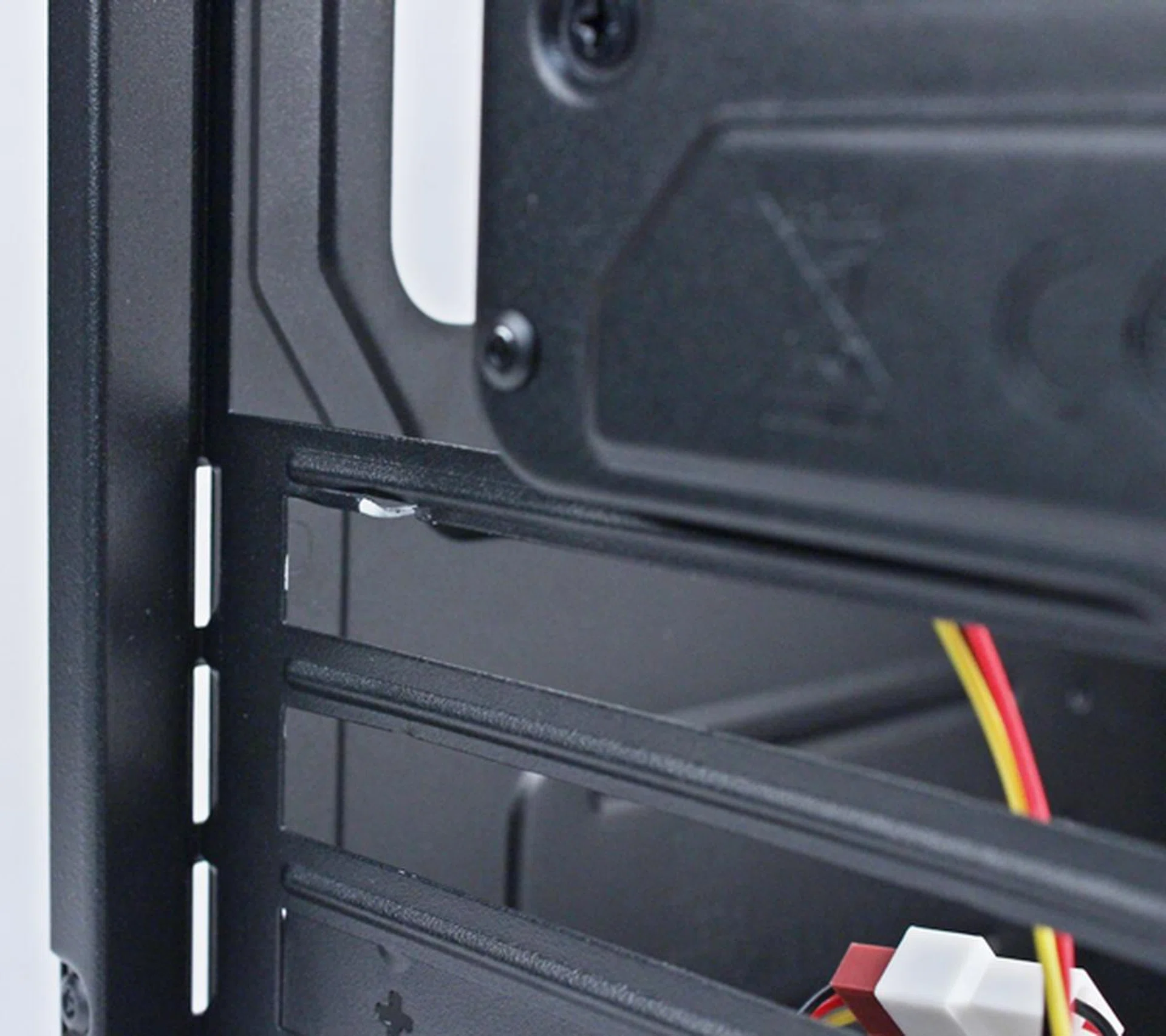 We accidentally damaged one of the edges of the first expansion slot of the CM Force 500 as we bashed out its cover.