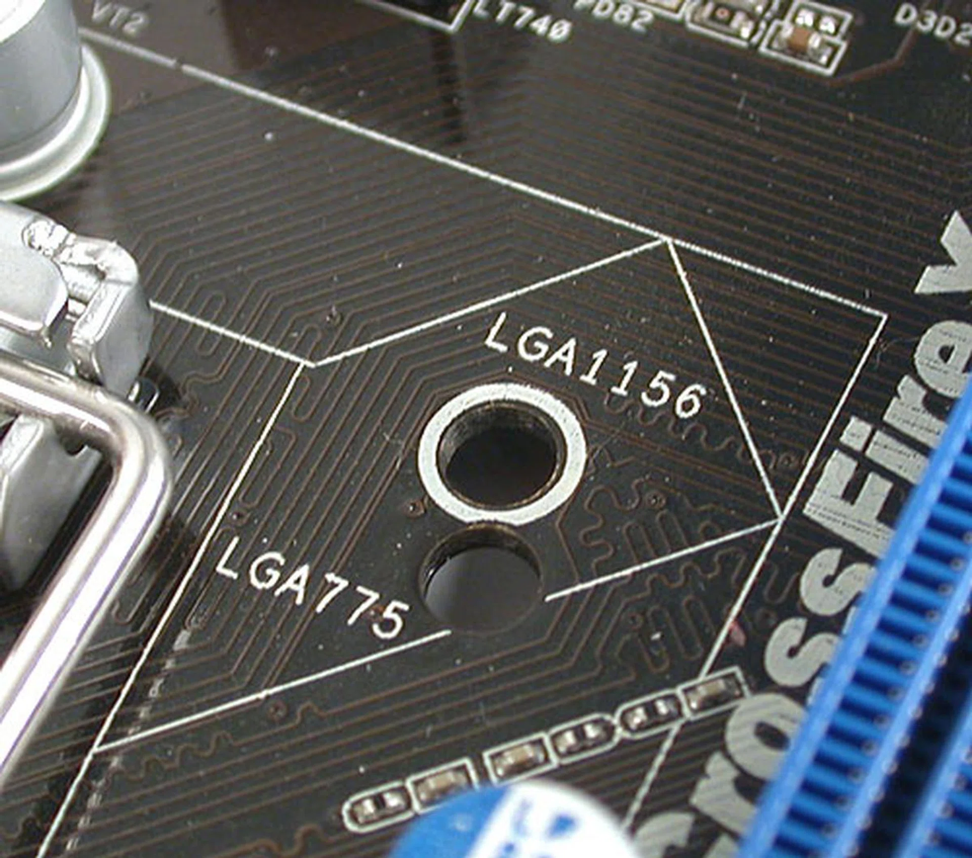 An interesting twist for those who have a good LGA775 cooler that they are not willing to part, this ASRock board comes with two sets of mounting holes, allowing you to continue using older LGA775 coolers. Our fear is the razor thin gap between the mounting holes above. Would it break with repeated changes of coolers?