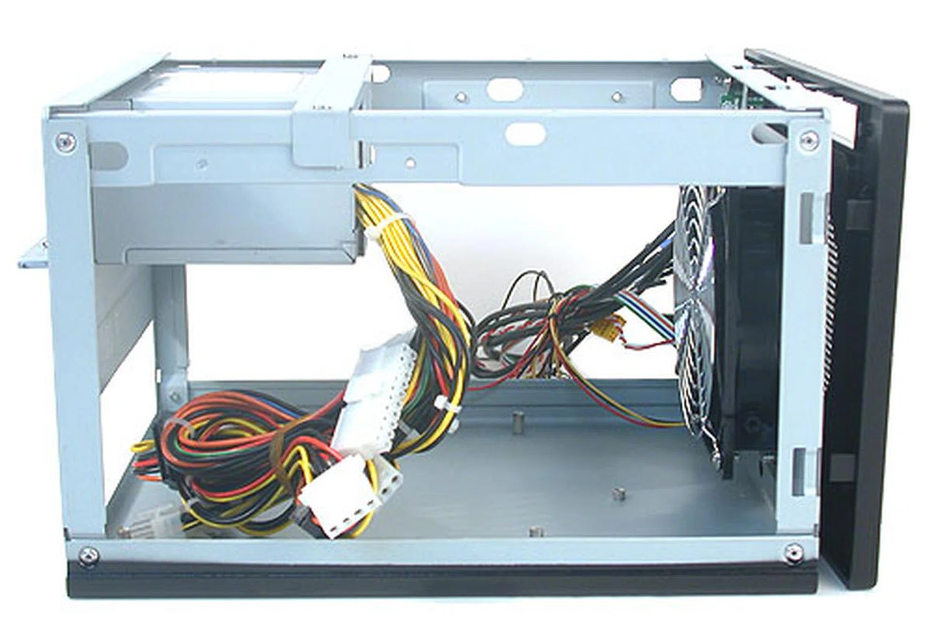 Removing the drive bay cage, this is the SG05 in its naked glory and the amount of space available for the system components. 