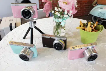 The NX Mini comes in white (not pictured), pink, mint green and brown.