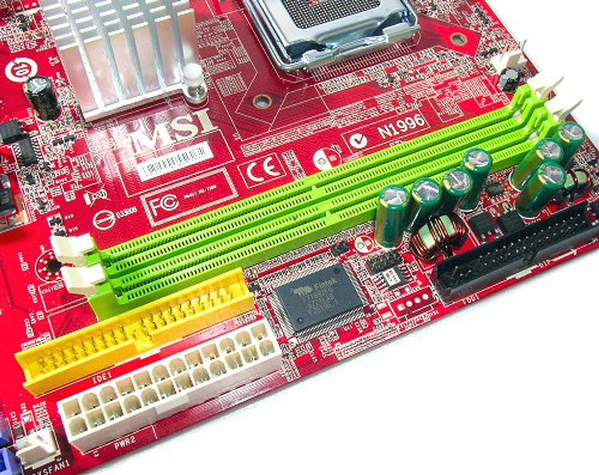 There is plenty of room between the DIMM and CPU socket for better placement of the memory subsystem without having to squeeze it close to the IDE connector.