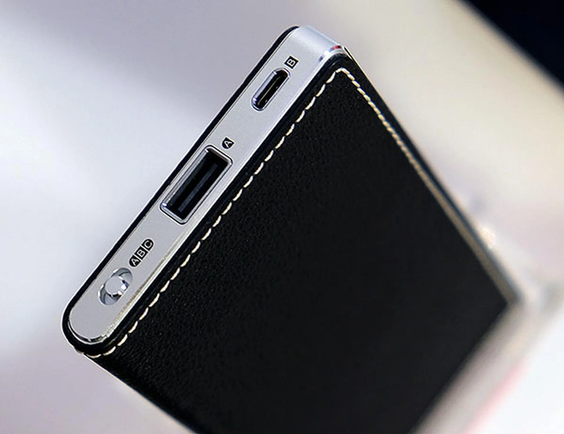 The HA-2SE can play music from up to three sources. A: USB, B: micro-USB, and C: line-in.