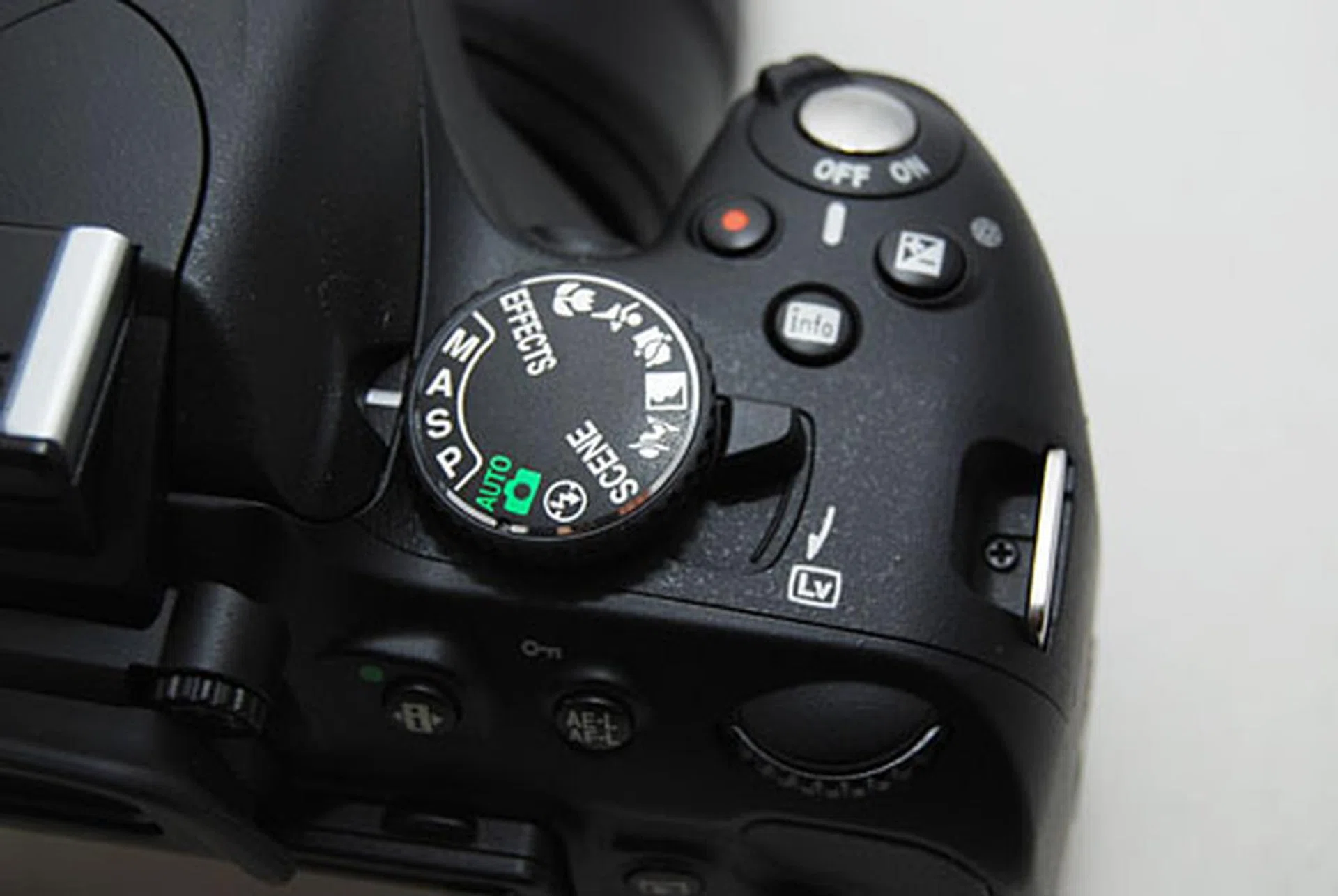 The new Live View flip sits beneath the mode dial, and the video Record button is now to the left of the shutter release.