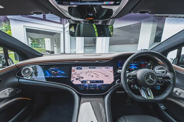 The MBUX Hyperscreen is a large 56-inch swathe of glass housing three displays. (Image source: Mercedes-Benz)