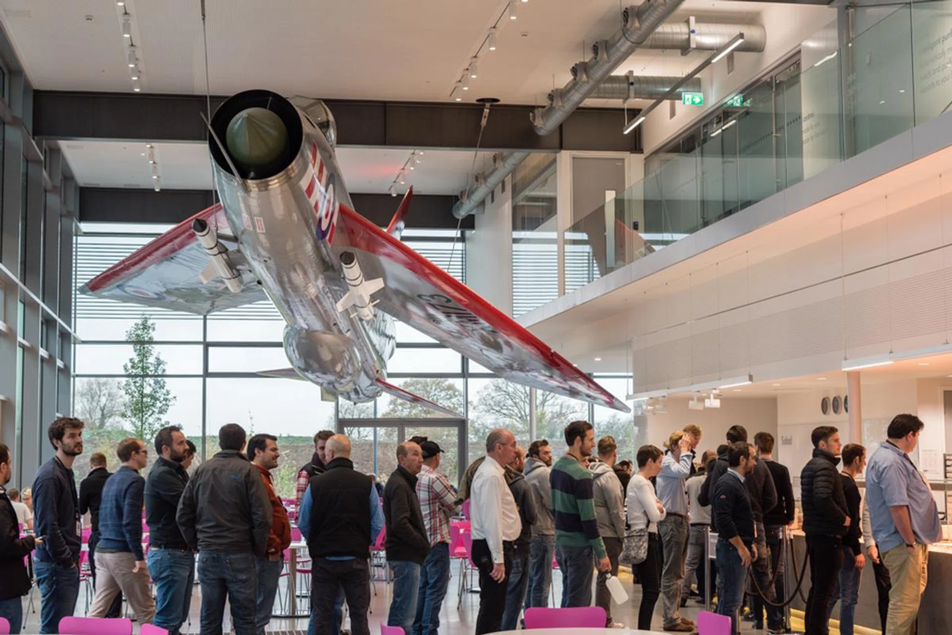 A fully restored Electric Lightning Jet hangs suspended in the new cafeteria.