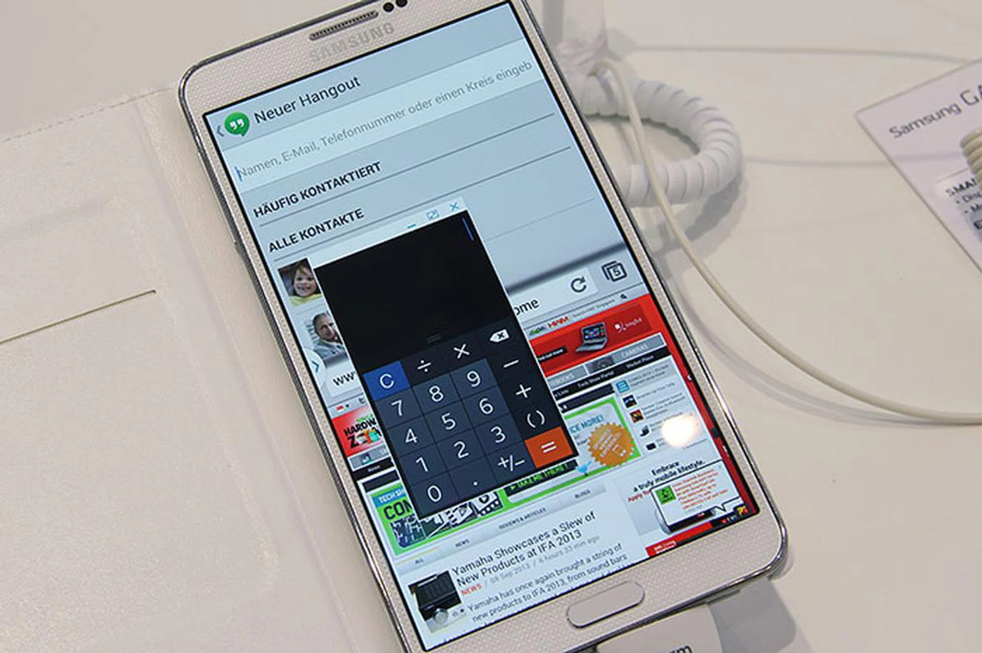 Here, you can see how one of the Pen Window apps (Calculator) floats above the two windows we've opened.