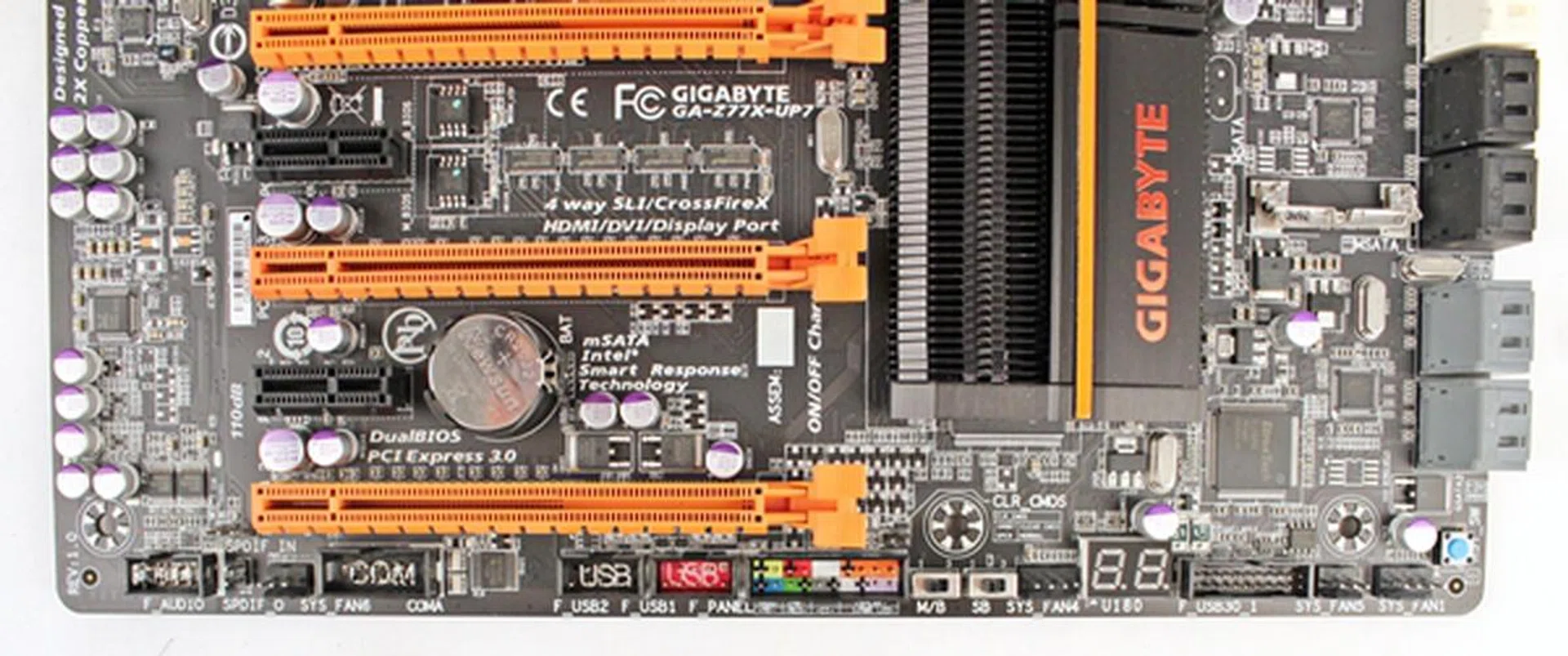 At the edge of the board where the headers are located, we are pleased to see the color-coded front panel header as it makes it easier to connect those tiny wires from the chassis.