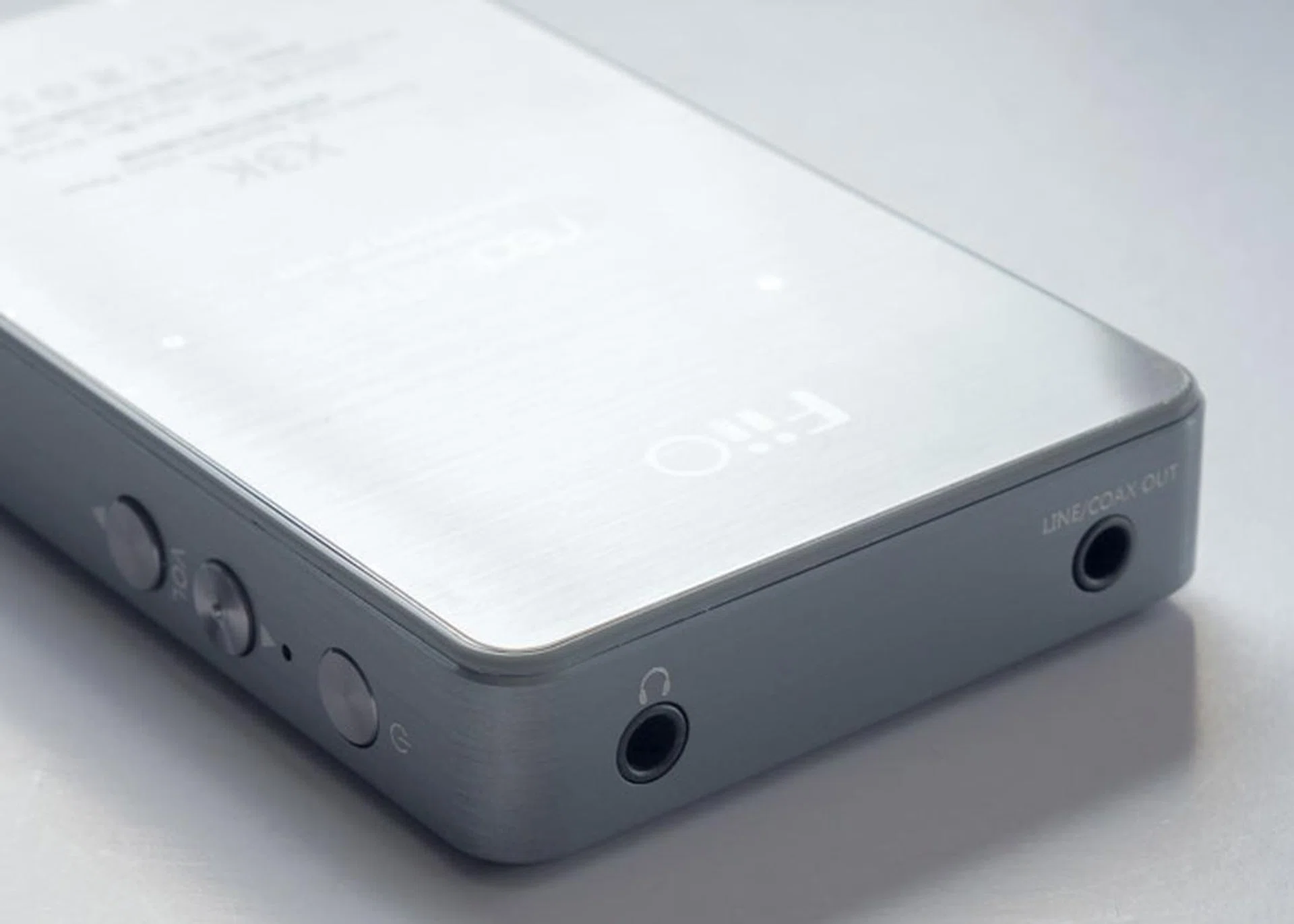 You get a Coaxial/Line out jack on the top of the player.