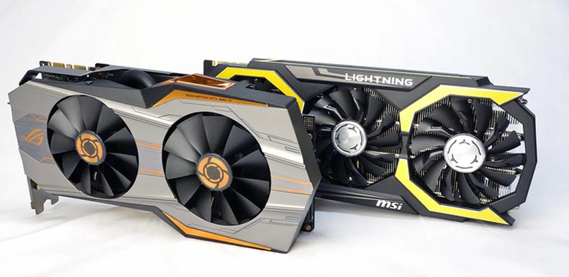 (left) The ASUS ROG Matrix GTX 980 Ti Platinum Edition card; (right) the MSI GeForce GTX 980 Ti Lightning card. Take a good look at them as these high-end cards could be the last of their prestigious breed.