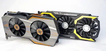 (left) The ASUS ROG Matrix GTX 980 Ti Platinum Edition card; (right) the MSI GeForce GTX 980 Ti Lightning card. Take a good look at them as these high-end cards could be the last of their prestigious breed.