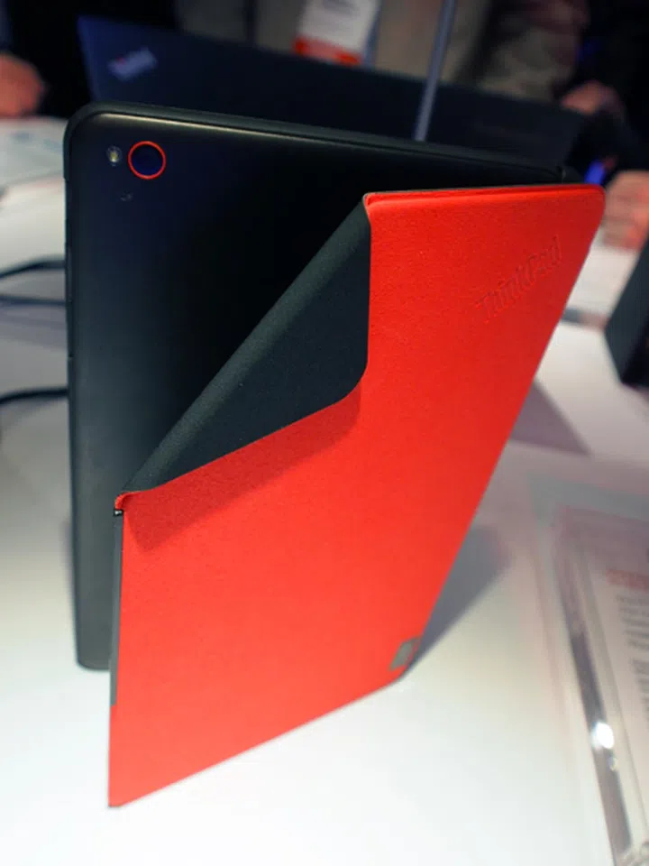 The Thinkpad 8's case has a magnetic flap that can be pulled down to expose the camera. Doing so will automatically activate the camera app.