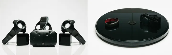 The HTC Vive Pre with its controllers (left) and the UA HealthBox fitness tracker kit by HTC and Under Armour (right).