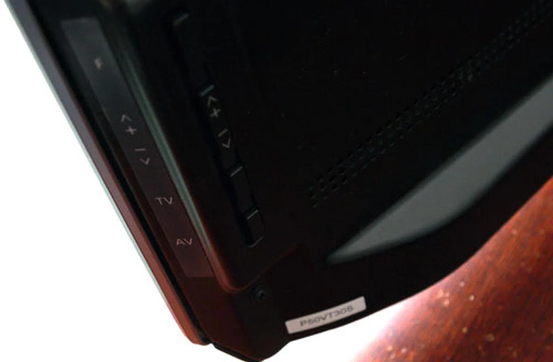 Instead of touch-sensitive controls, Panasonic is still relying on hardware buttons such as a rocker switch for volume levels as well as TV and AV buttons planted behind the panel. The display's slim 37mm depth is offset substantially by the speakers' housing below.