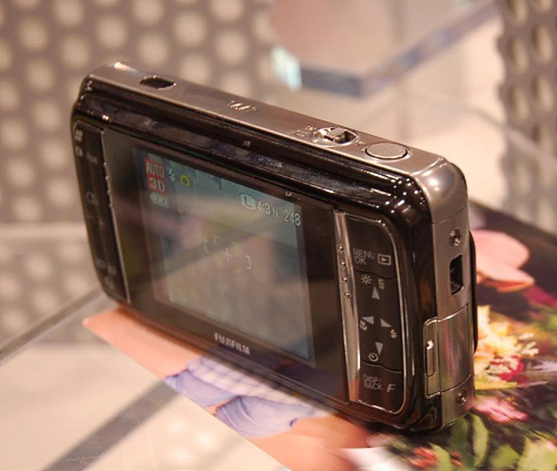 Here is the 3D camera, the W1. While you can view the captured image in 3D on this camera, if you want the 3D image in print, you'll need to send it to a lab in Tokyo to get it printed. Estimated turnaround time is 10 days with a US$5 fee.