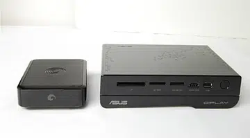 For size comparisons, we've the German Leopard tank aka the ASUS O!Play HD2 on the right and the Seagate GoFlex TV on the left.