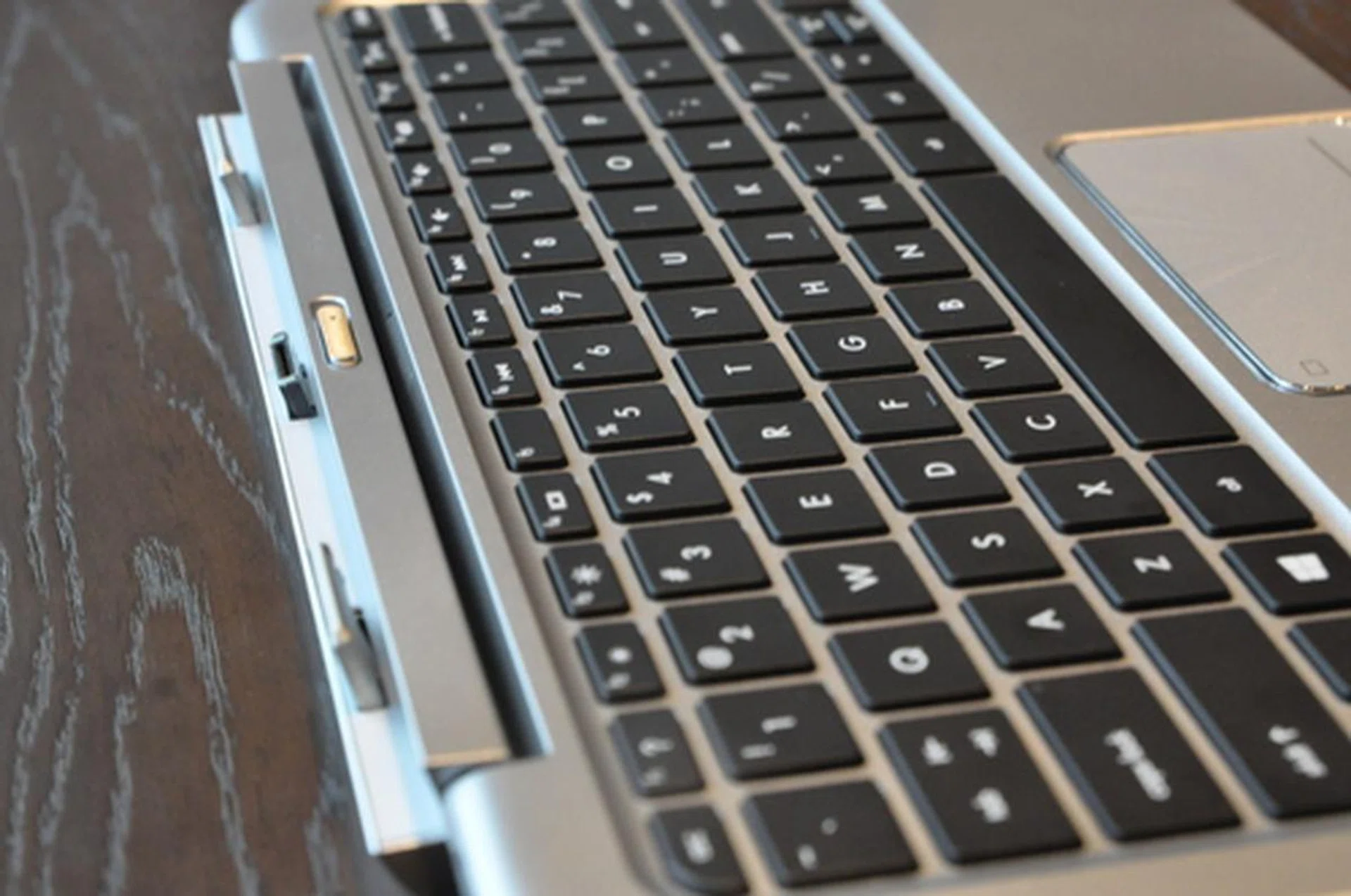 Magnetic latches help guide and secure the tablet in place. 