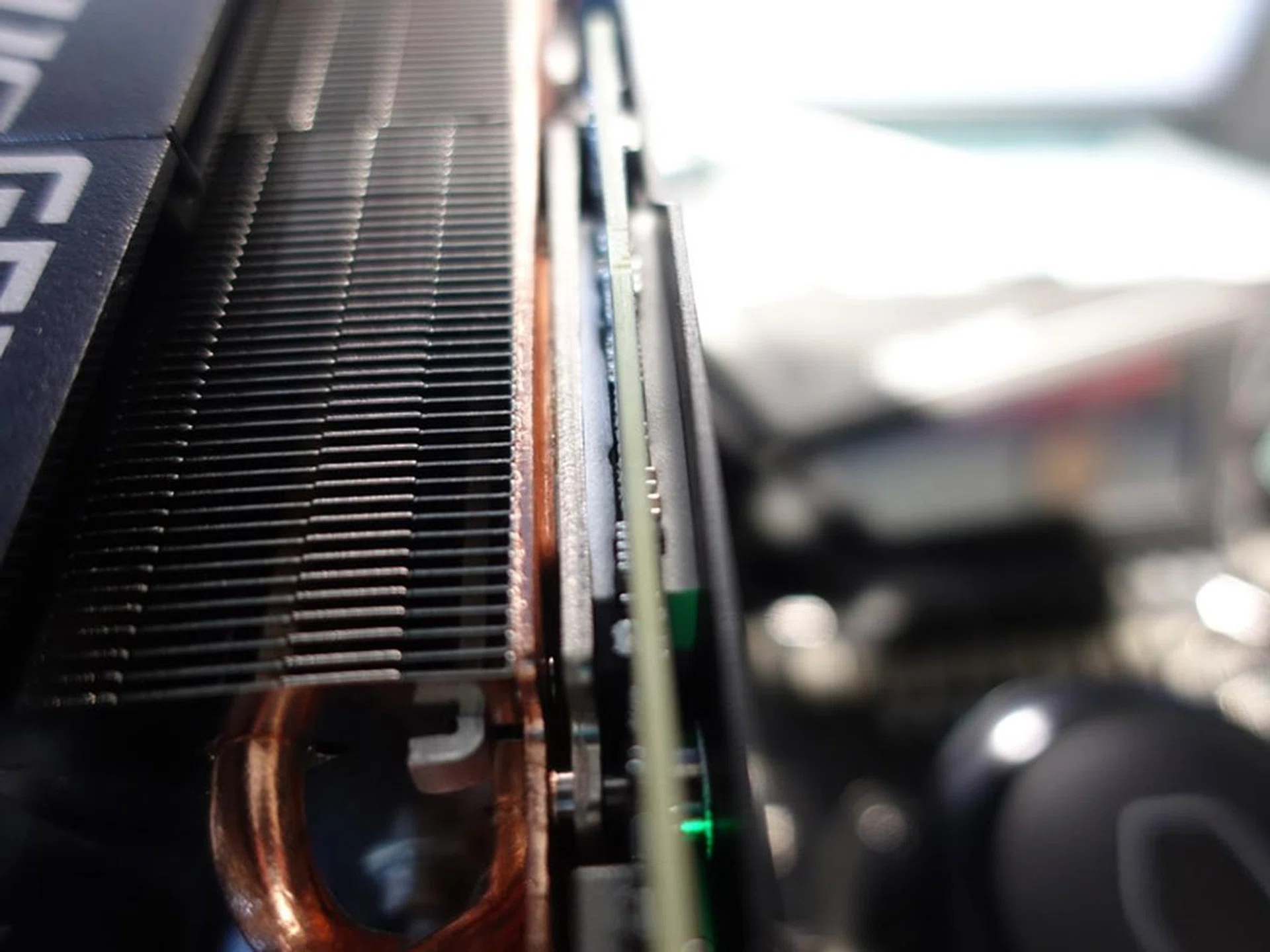 Remember I mentioned earlier how the visible the thermal paste is between the heatsink plate and the GPU?