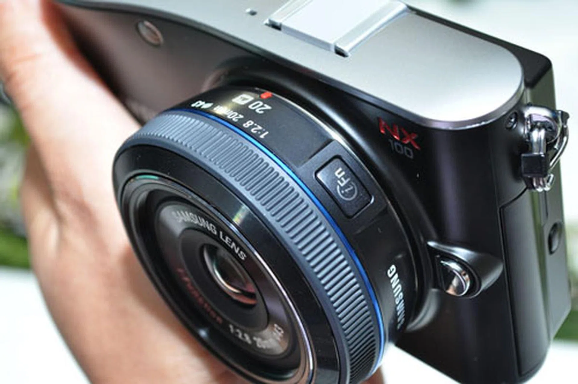 The new i-Function button is marked iFn on the lens.