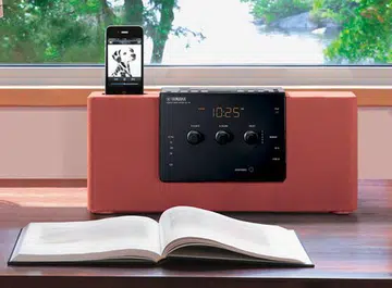 The TSX-140 is the newest desktop speaker docking system Yamaha has to offer. Though its design is vastly different from the TSX-130 with its earthly colors, it has many similar hardware specs within like the twin 8cm full-range drivers that are each driven by a 15-watt digital amplifier.
