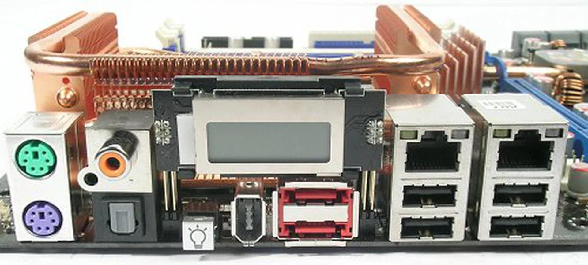 Legacy ports give way to the LCD Poster. The rear panel also has a healthy dose of eSATA, S/PDIF, FireWire, USB 2.0, RJ45 and PS/2 ports. The small switch with the light icon toggles the LEDs onboard.