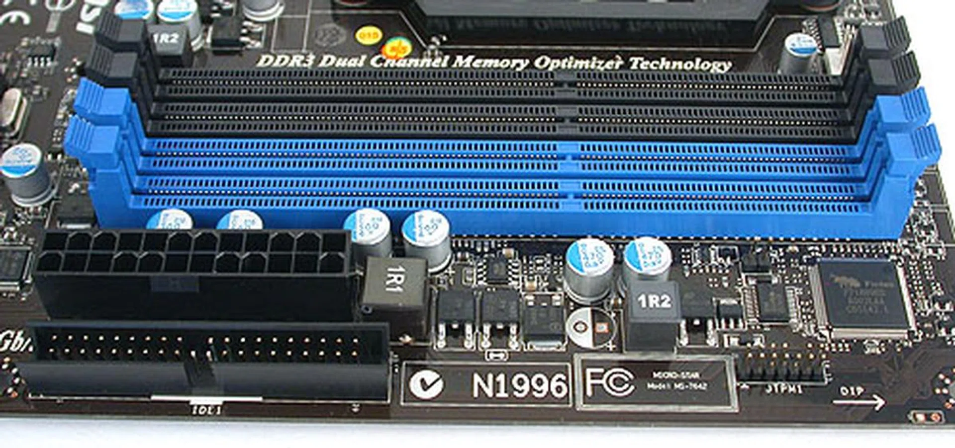 The power connector and an IDE connector are located near the DDR3 DIMM slots. This appears to be a common layout among motherboards.