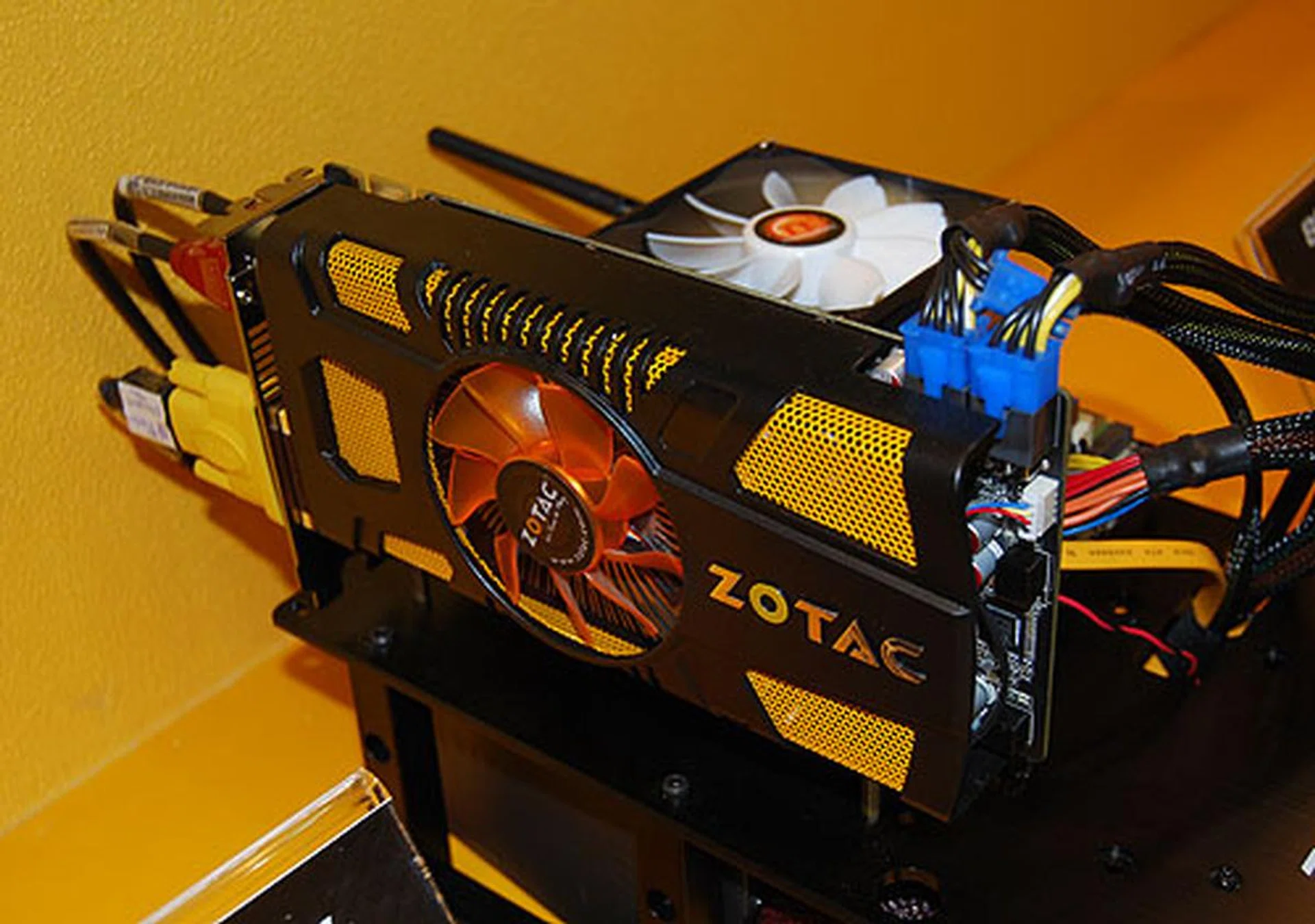 This custom GeForce GTX 560 is unique for having five display outputs. It has two dual-link DVI outputs, one DisplayPort and two HDMI. Link the DVI to the DisplayPort and together with the two HDMI, this card will support three monitors. It's clocked at 820MHz for the core and with a memory clock of 4008MHz DDR5 for its 1GB memory.