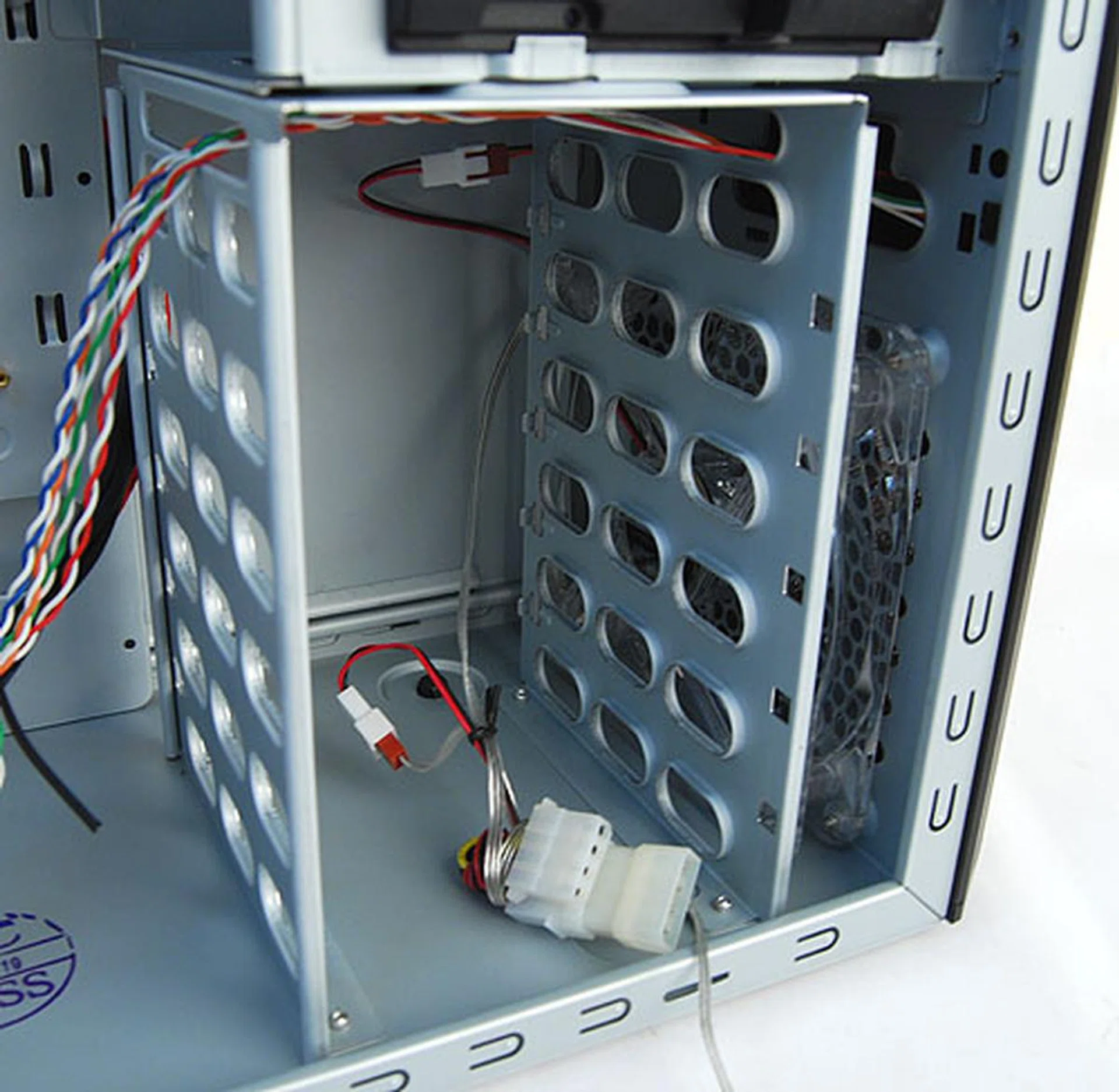 The HDD cage sits directly behind the 140mm front intake fan, which is a good thing since it'll cool your hard drives down.