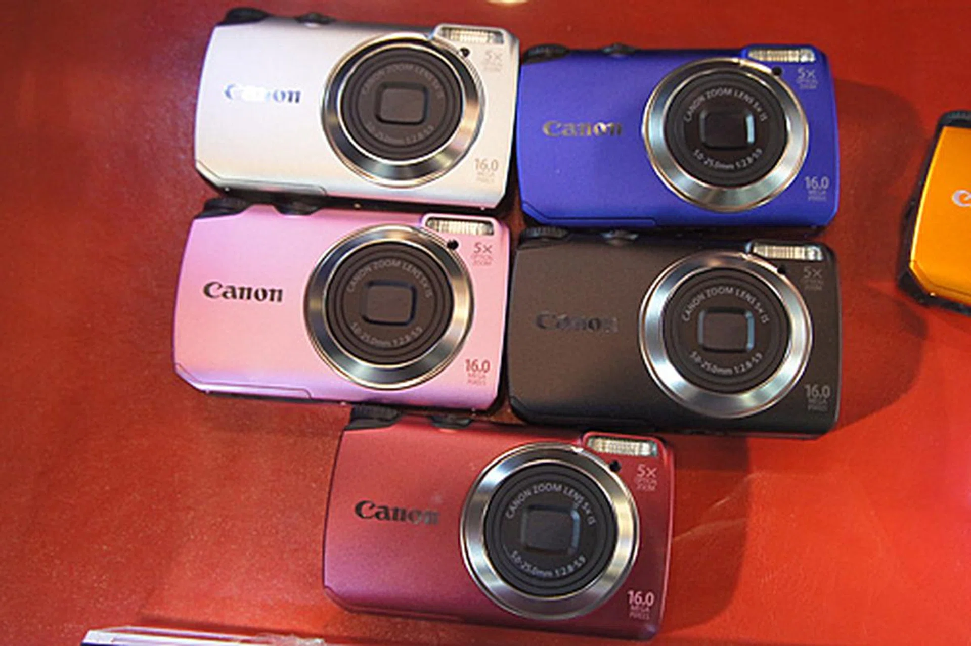 The 16-megapixel PowerShot A3300 IS comes with a 28mm lens with 5x optical zoom, a 3.0-inch LCD, a Smart Auto mode that detects 32 different scenes, and a Discreet mode that turns off the flash and mute the camera's operational sounds. It also does 1280 x 720 HD movie recording. It's selling for $299 and freebies include two 8GB SD cards.