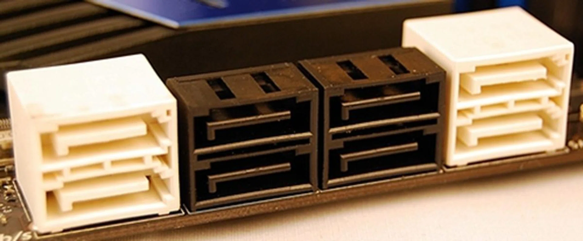 The white SATA connectors are the SATA 6Gbps capable while the black ones are the SATA 3Gbps ones. Sufficient for most high-end users, but it's probably not rivaling some of the storage server monster class boards we've seen. Still, we would have preferred if all of the SATA ports were capable of 6Gbps transfers.