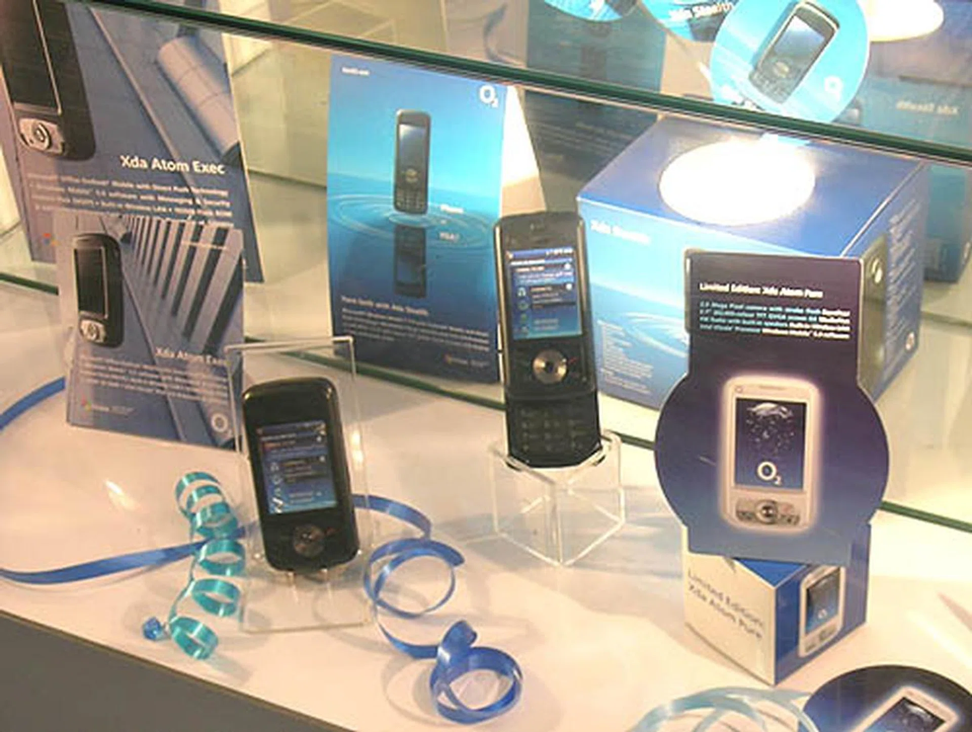 O2's new Xda Atom Exec PDA phone is the highlight at the O2 booth but other recent products like the O2 Stealth can also be found.