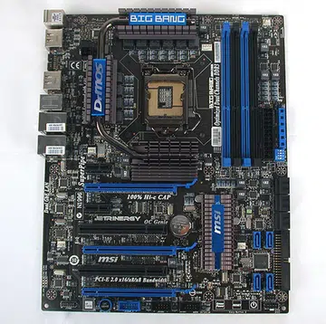 Keeping with a heavy use of black and dark blues, this new Big Bang Trinergy is recognizably a MSI motherboard of recent pedigree.