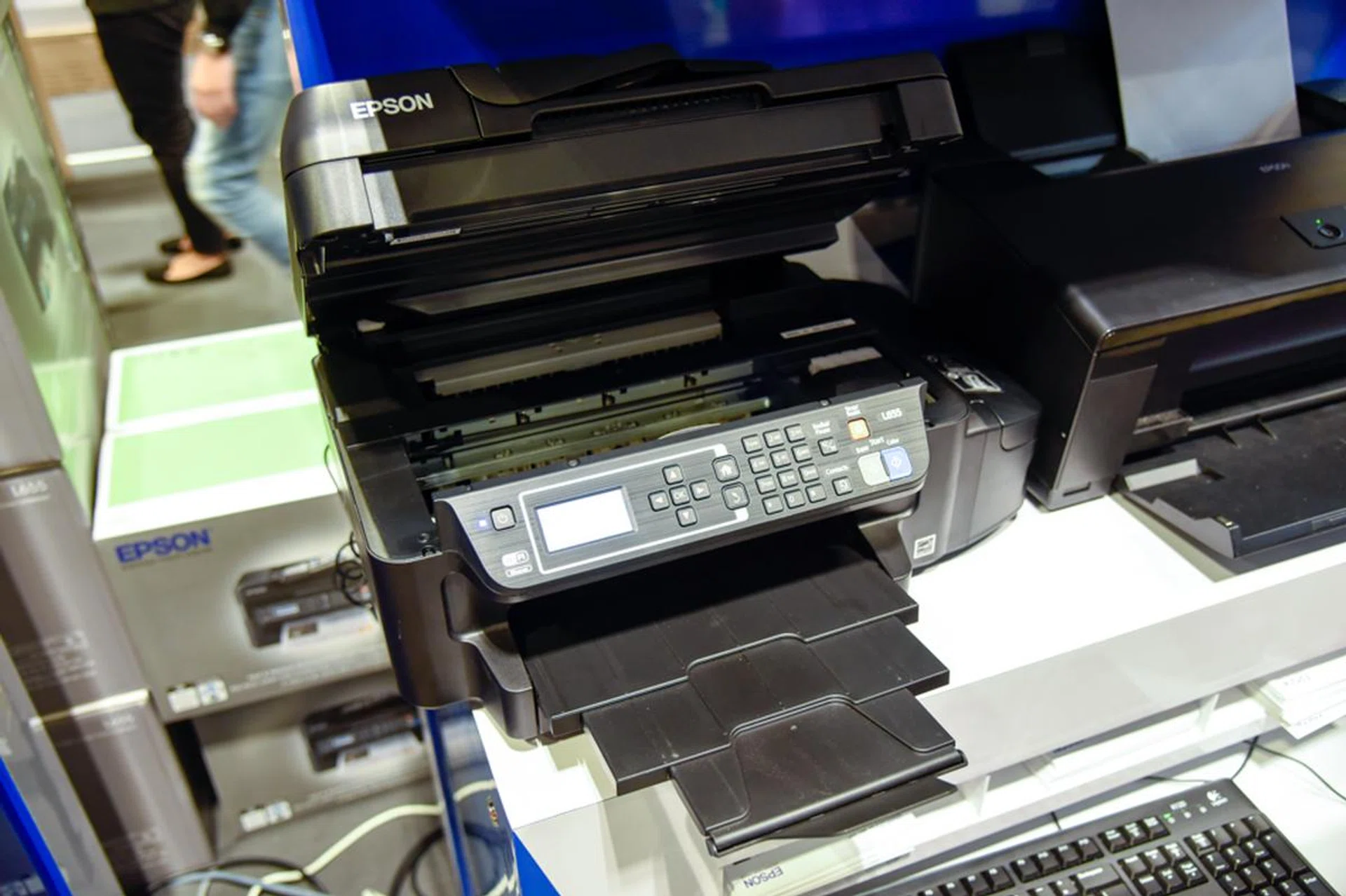 The Epson L655 is a duplex 4-in-1 ink tank system printer going for S$499 (U.P. S$539). Print speeds of 33ppm (mono) and 20ppm (color). Wi-Fi/Wi-Fi Direct/Ethernet connectivity, and you can trade-in used laser or inkjet printers for a S$60 NTUC voucher when you buy a L655.