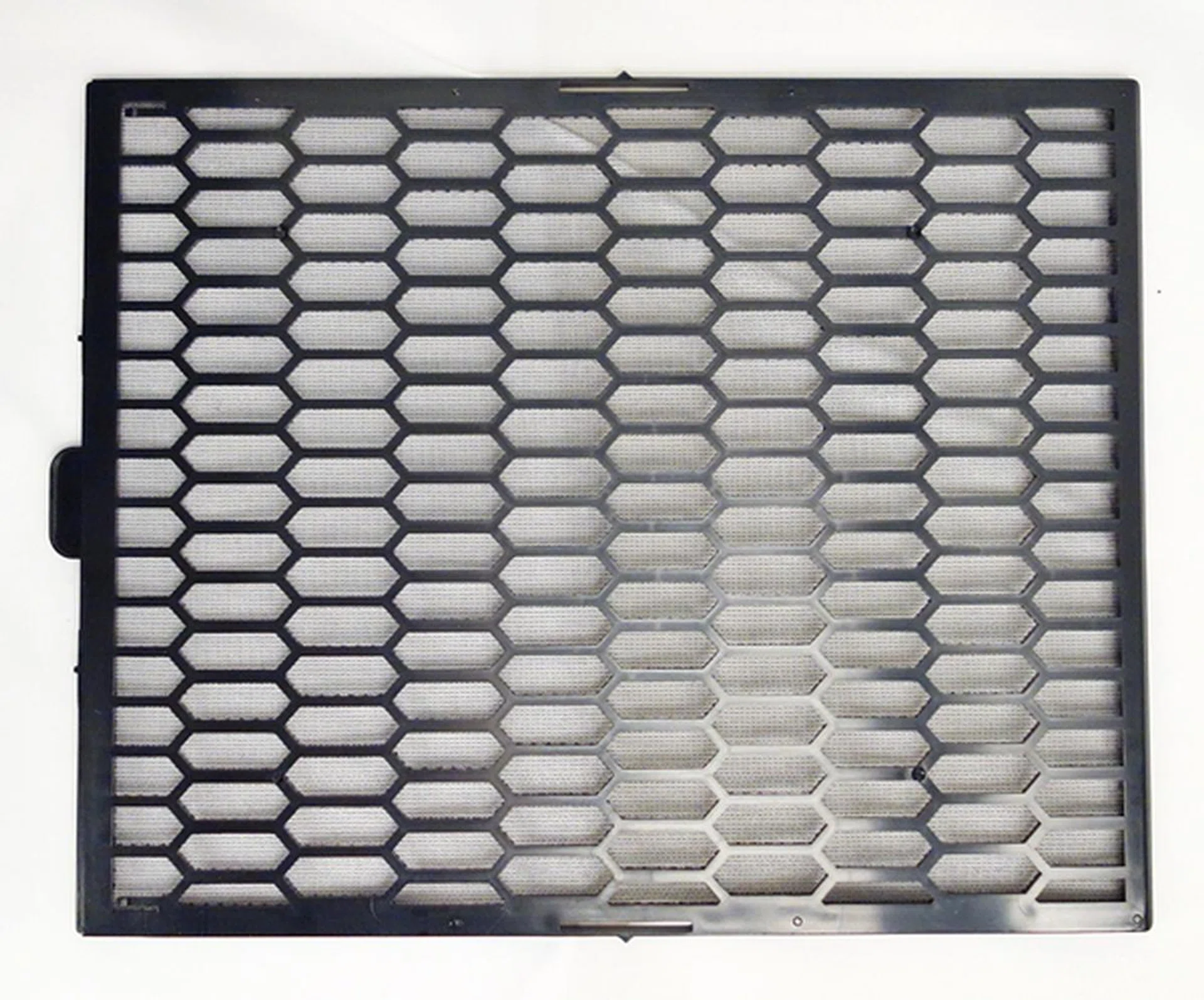 This is the top removable dust filter of the Raven RV04. It has a fine plastic mesh that feels sturdy to touch.