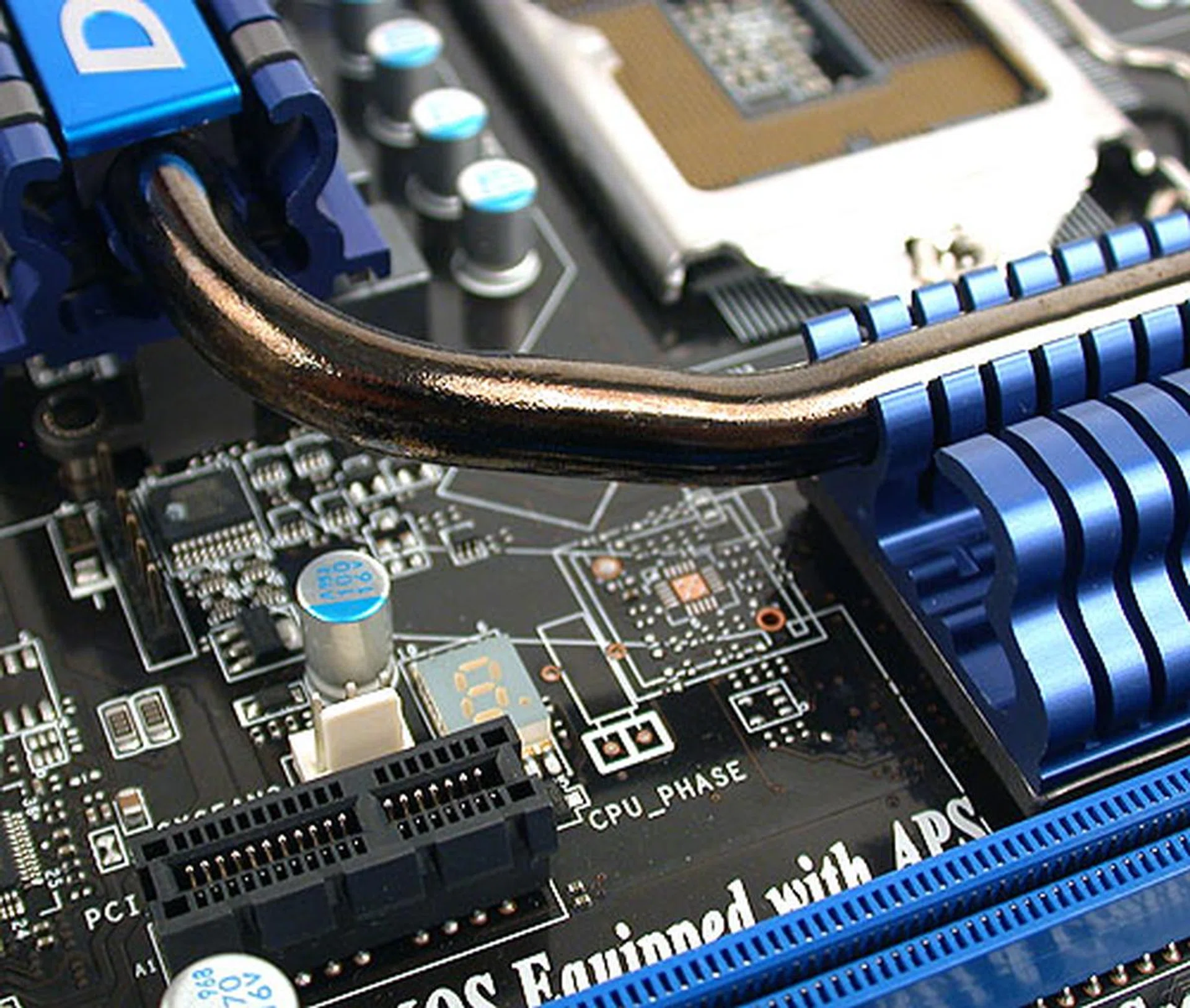 At 8mm thick, MSI's SuperPipe claims to be thicker than the competition's heat pipe solution by channeling away more heat. We'll see about that in our test later. You can also catch a glimpse of the LED indicator for the CPU power phases here.