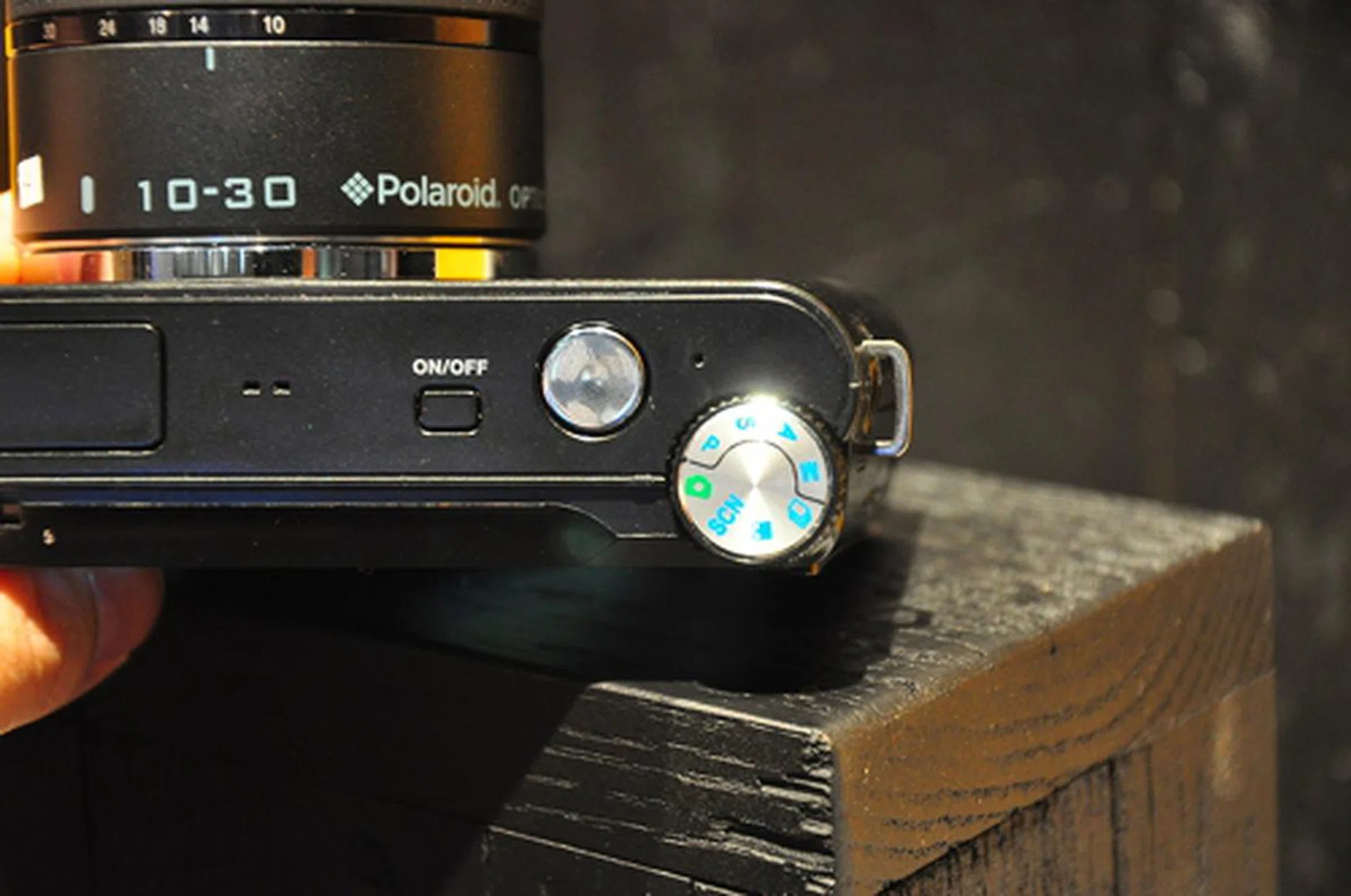 If you are familiar with the symbols, the dial allows you to toggle between the usual aperture, shutter, manual and scene modes.