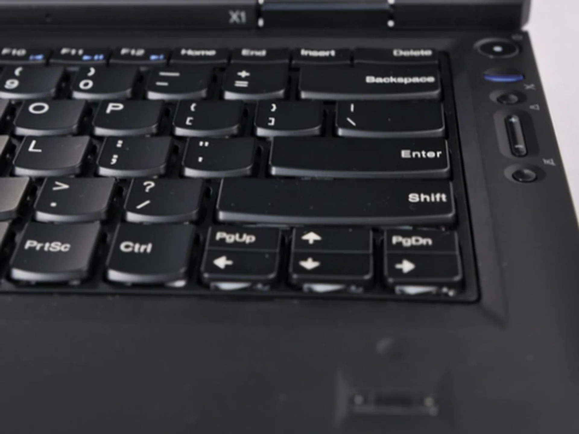 To make some extra space, the power, recover buttons, and audio control buttons have been moved to the right. Just right for righties, but quite wrong for lefties.