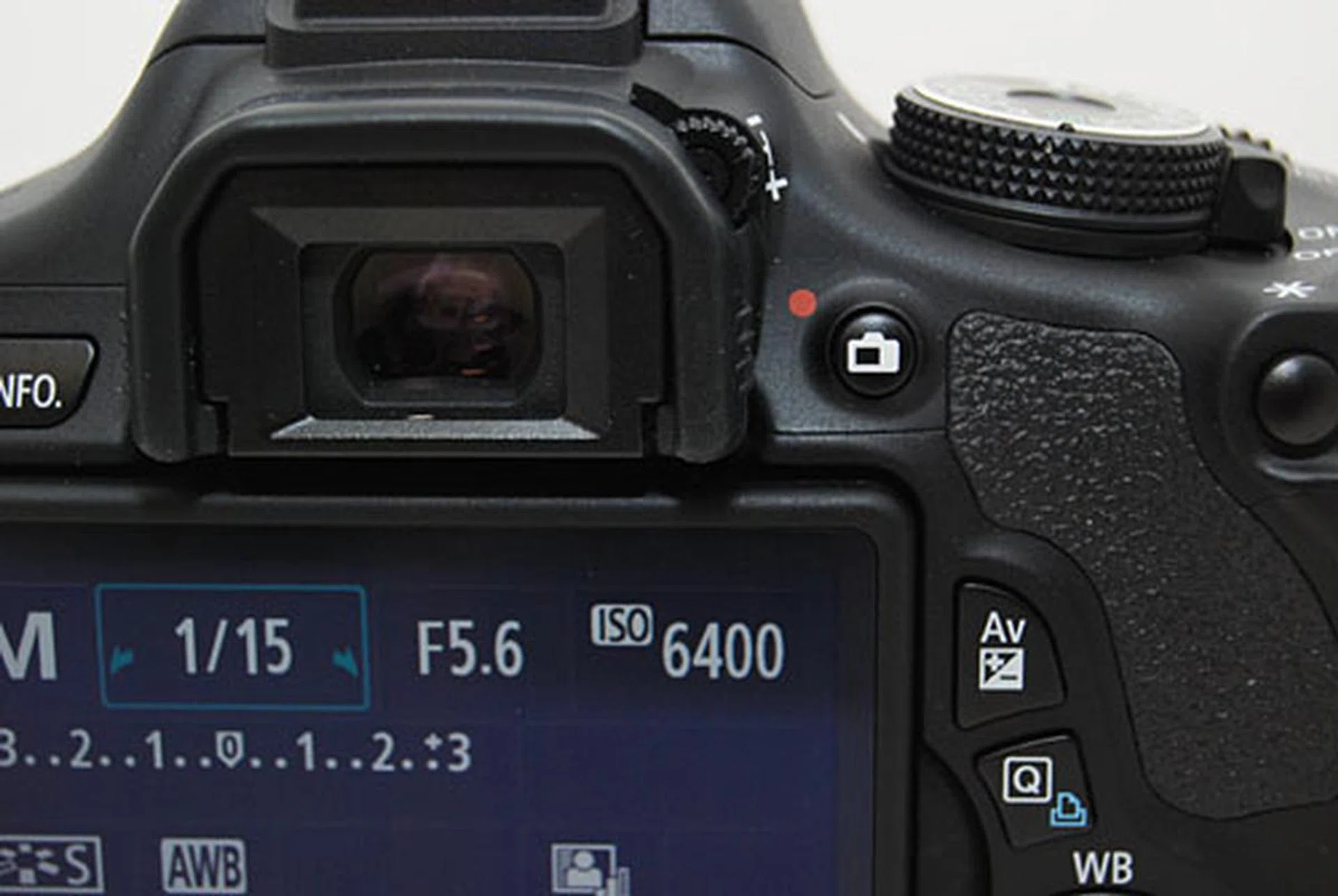 There is no dedicated video record button on the 600D, the Live View button only toggles between Live View and the optical viewfinder in shooting modes other than Video.