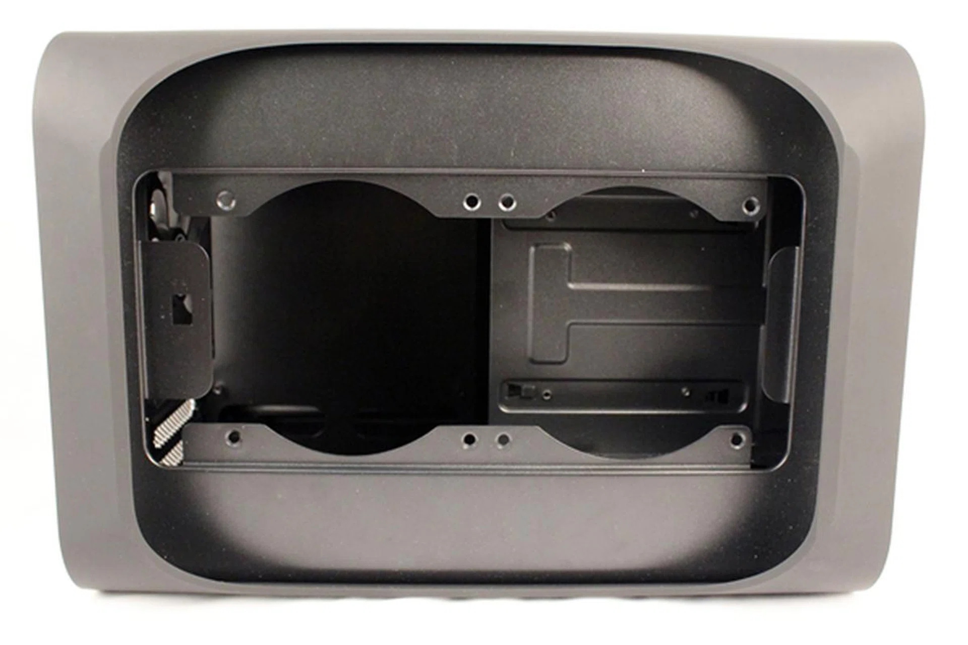 With its dust filter removed, we see the cut-outs for an optional pair of 120mm fans.